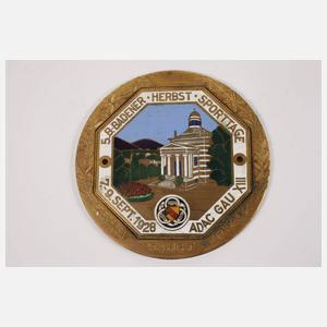 Drei Automobilplaketten