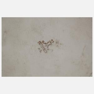 Vier Automobilplaketten