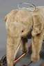 Steiff Elefant als Reittier auf Rädern mit Wippe