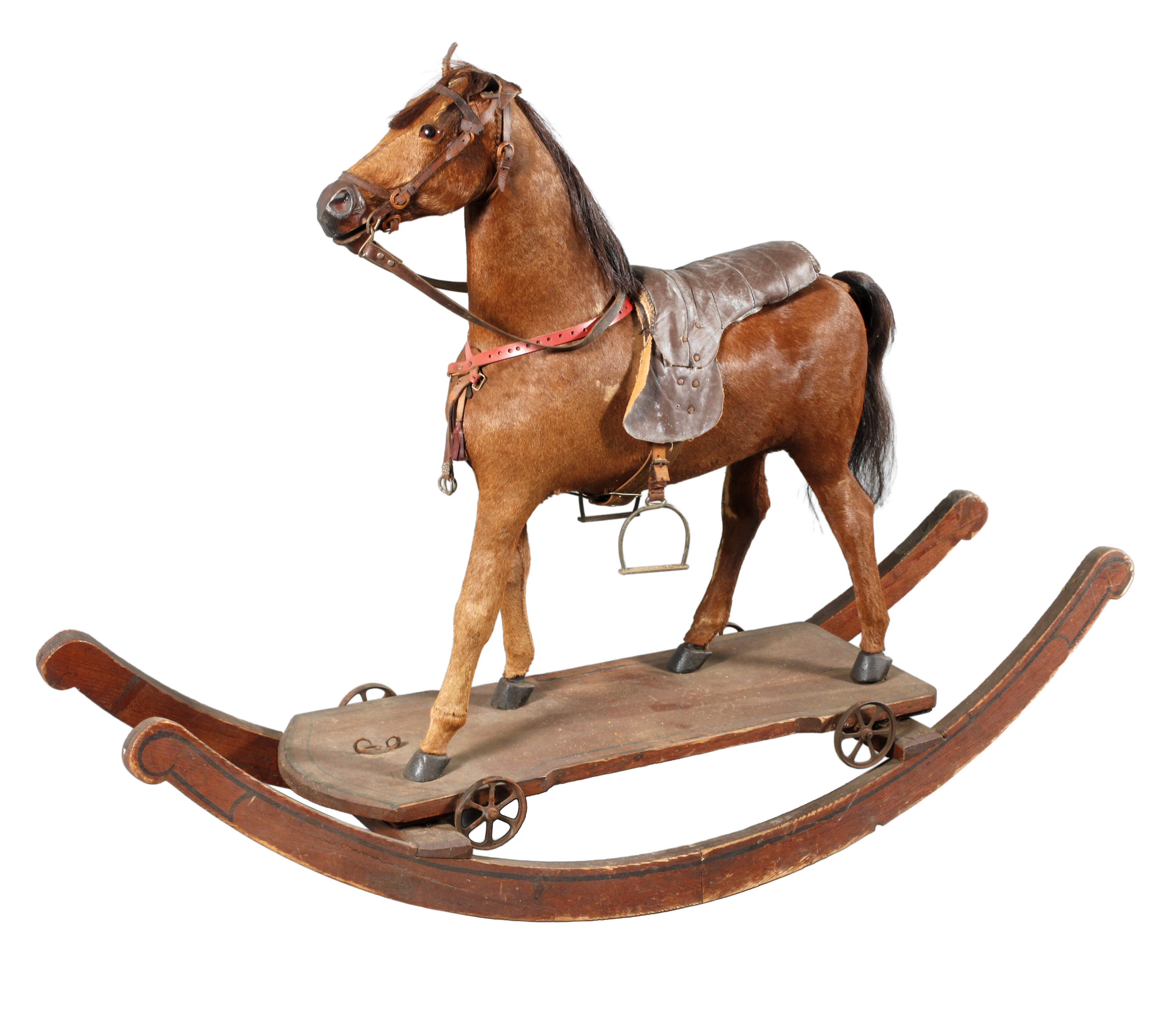 Pferd als Reittier auf Rädern mit Wippe