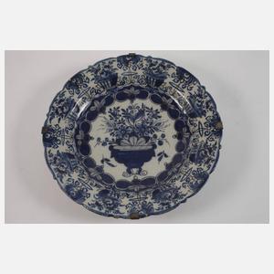 Vier Fayenceteller Blaumalerei