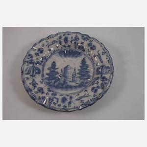 Vier Fayenceteller Blaumalerei