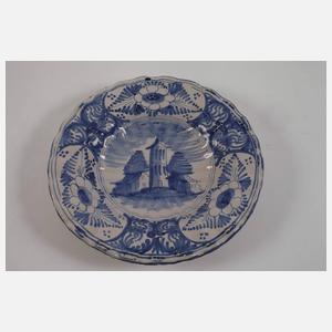 Vier Fayenceteller Blaumalerei