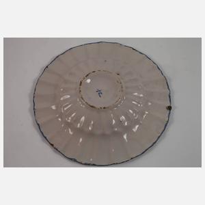 Vier Fayenceteller Blaumalerei