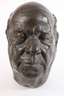 Großer Bronzekopf eines Mannes