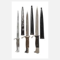 Drei Miniaturbajonette als Brieföffner111