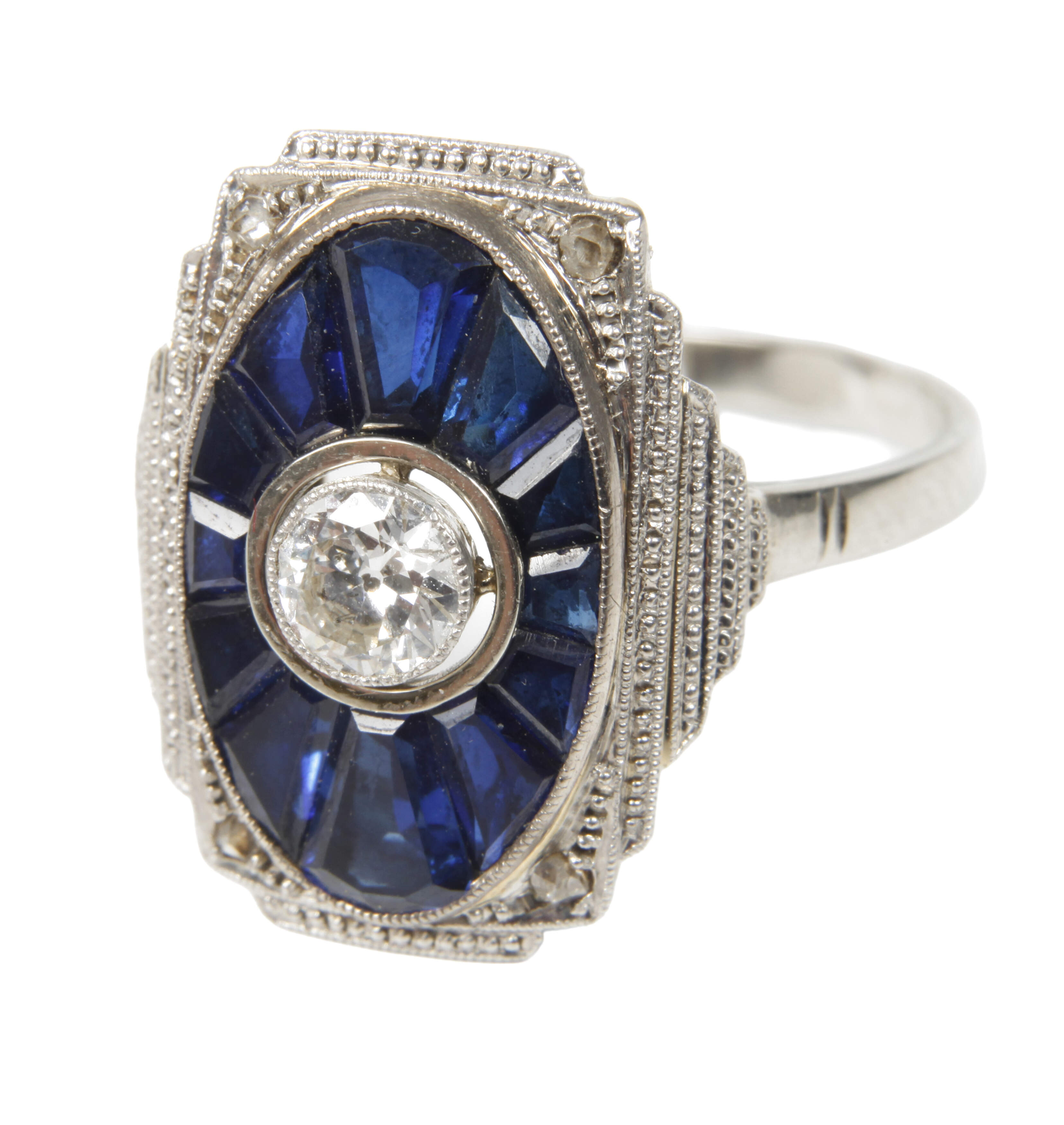 Feiner Damenring mit einem Brillanten und Saphiren