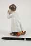Meissen ”Kind, aus einer Tasse trinkend”