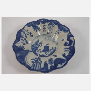 Vier Fayenceteller Blaumalerei