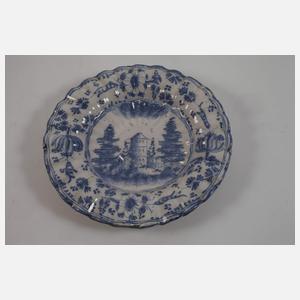 Vier Fayenceteller Blaumalerei