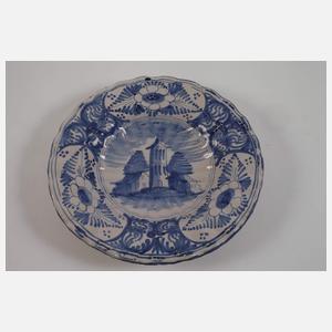 Vier Fayenceteller Blaumalerei