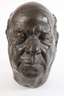 Großer Bronzekopf eines Mannes