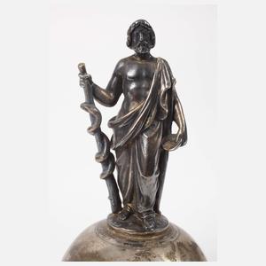 Figürliche Tischglocke