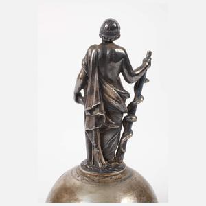 Figürliche Tischglocke