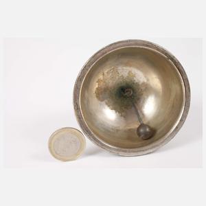 Figürliche Tischglocke