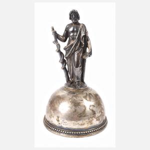 Figürliche Tischglocke