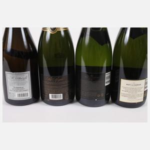 Vier Flaschen Champagner