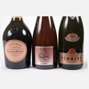 Vier Flaschen Champagner