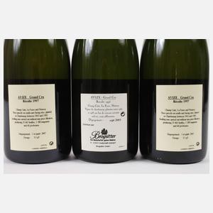 Drei Flaschen Jahrgangschampagner