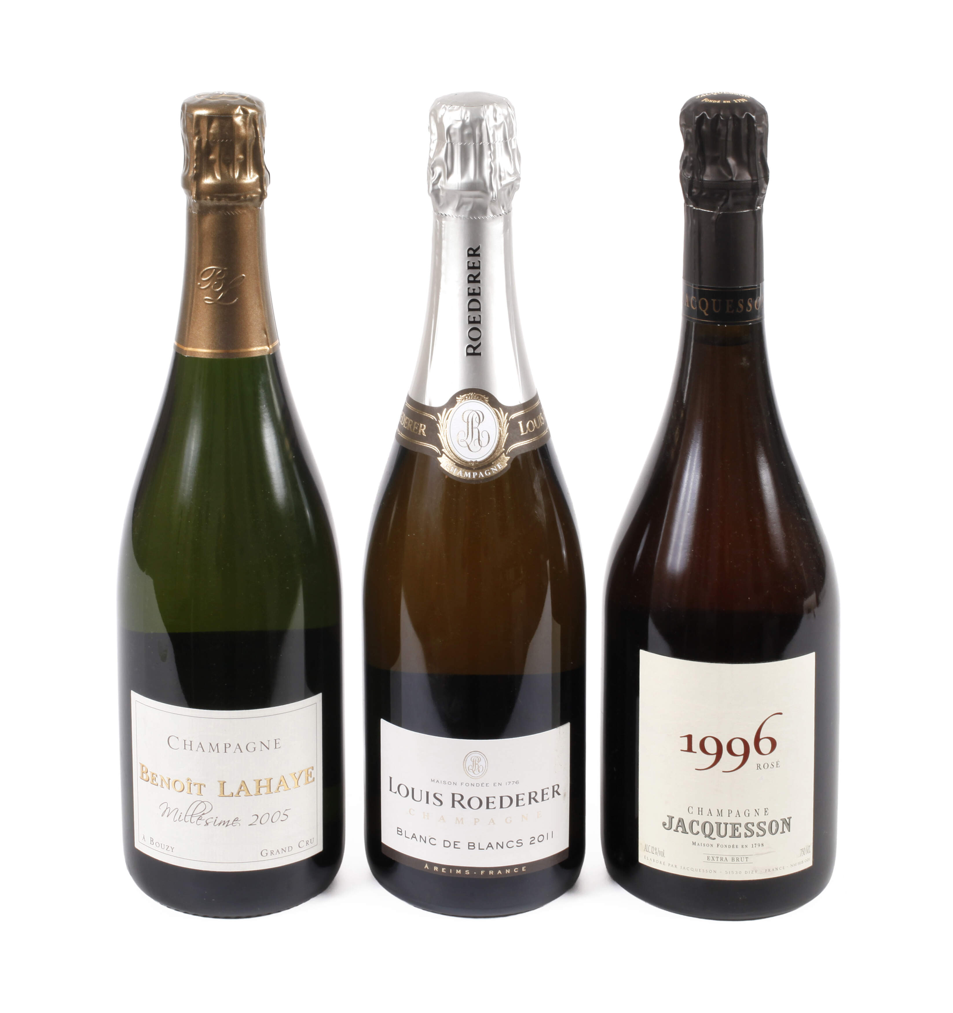 Drei Flaschen Jahrgangschampagner