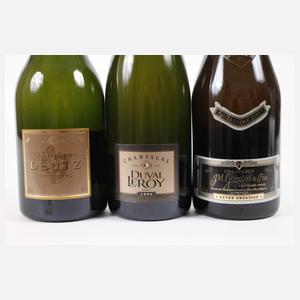 Drei Flaschen Jahrgangschampagner