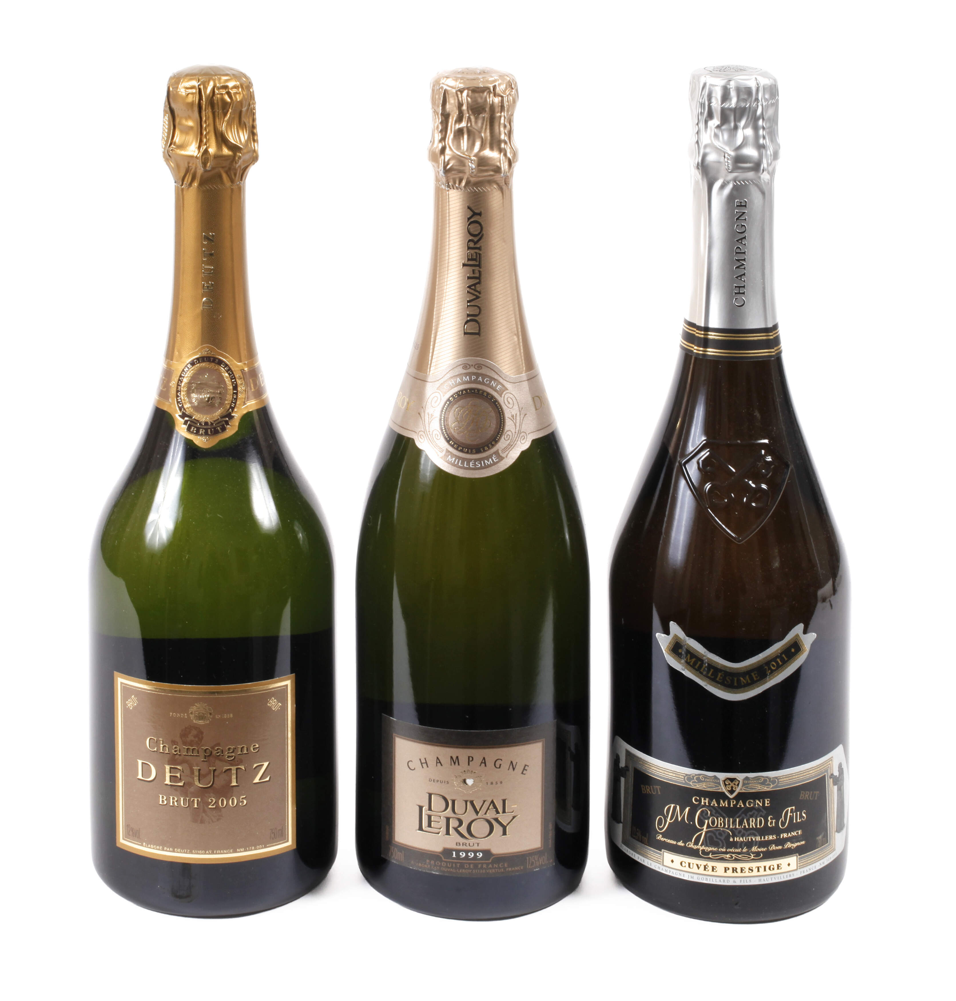Drei Flaschen Jahrgangschampagner