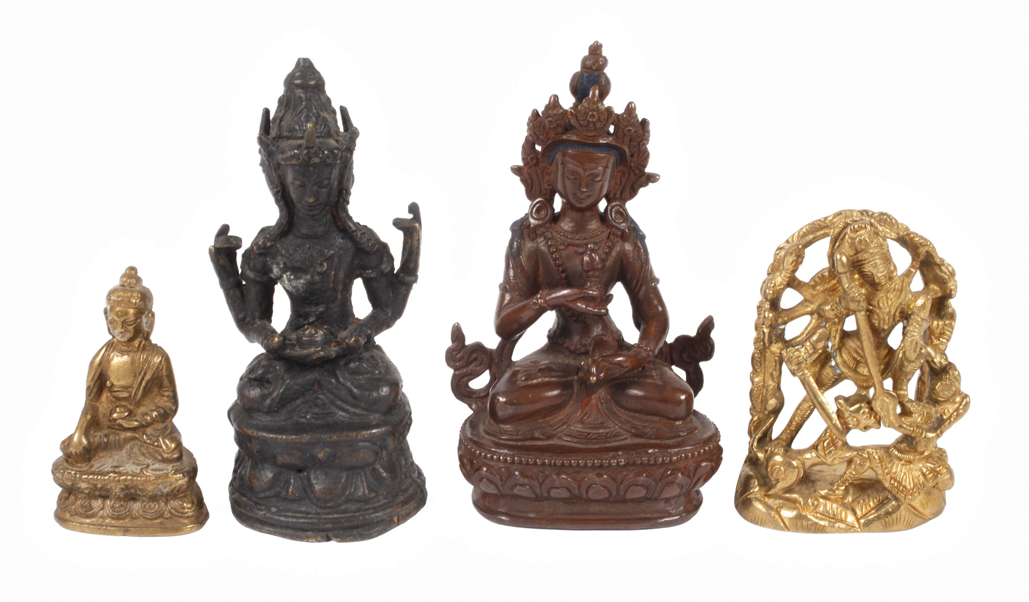 Vier Miniaturbronzen