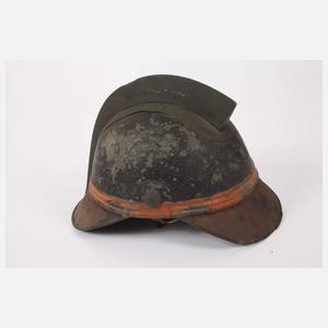 Drei historische Feuerwehrhelme