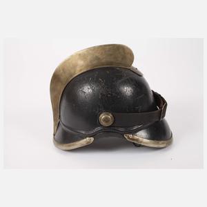 Drei historische Feuerwehrhelme