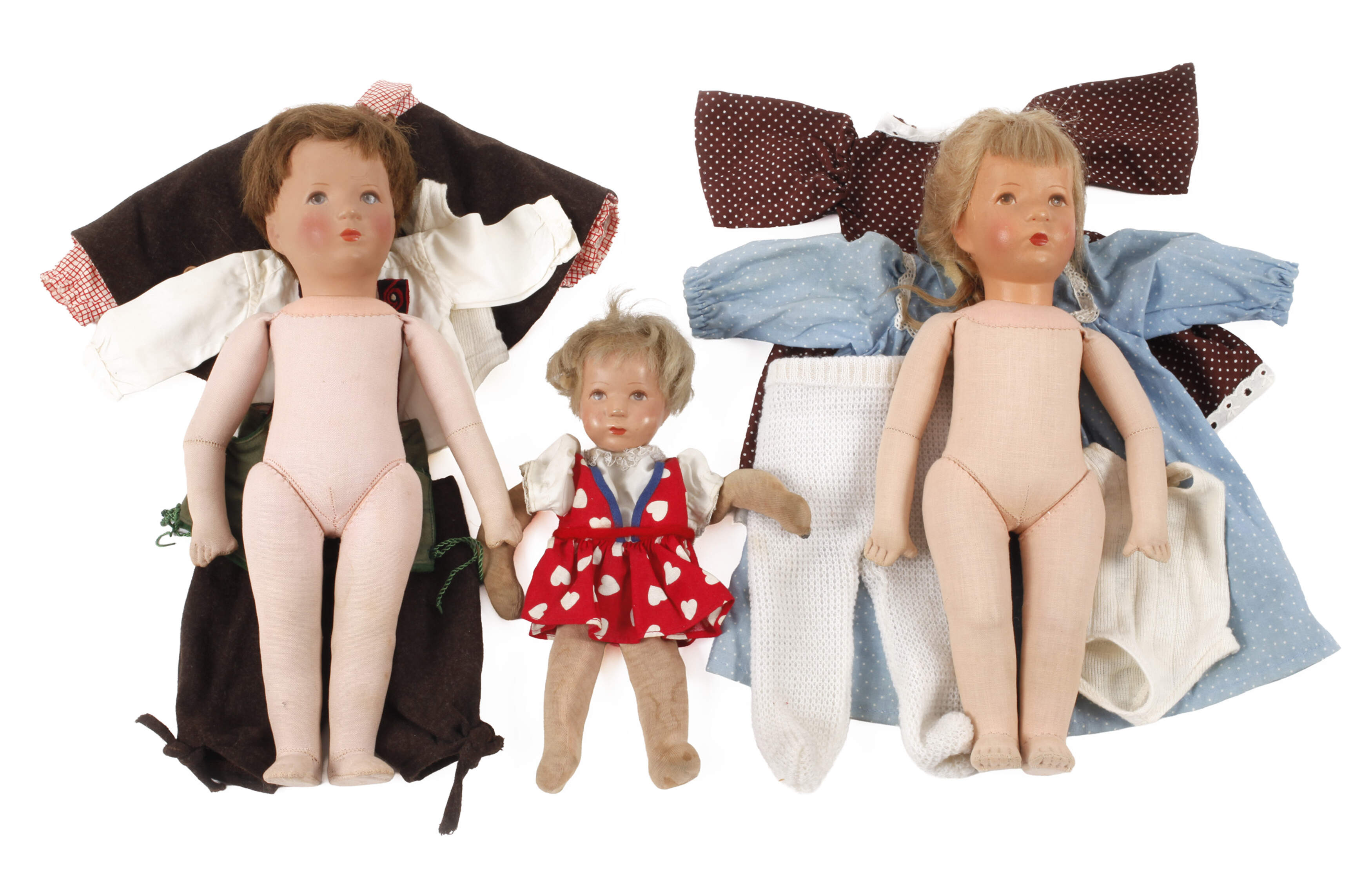 Drei Käthe Kruse Puppen als Familie
