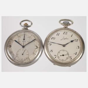 Vier Taschenuhren