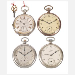 Vier Taschenuhren