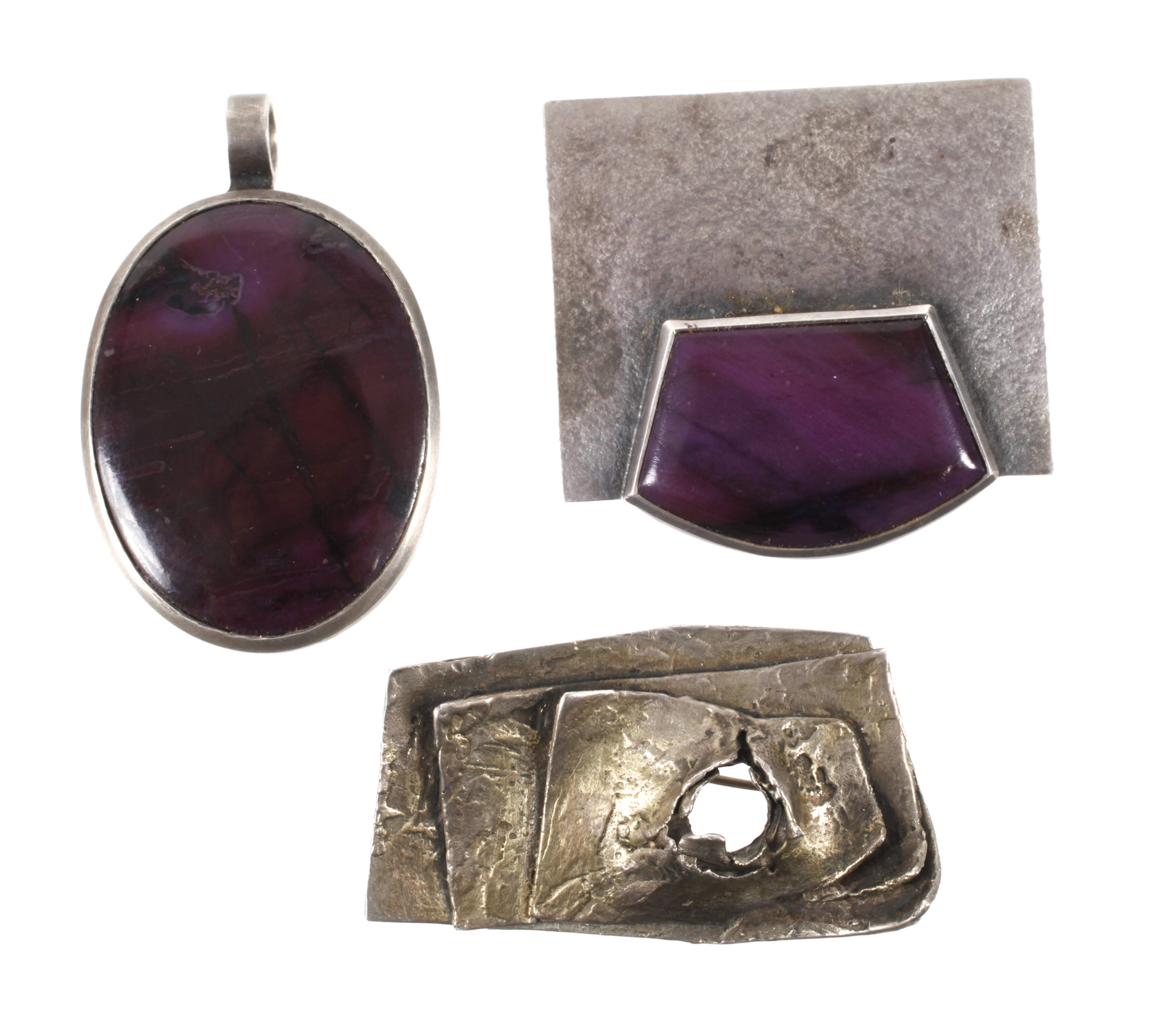 Drei Designer-Schmuckstücke