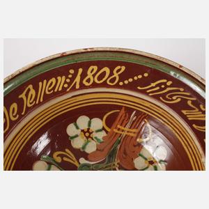 Hafnerkeramik mit Spruchband