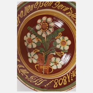 Hafnerkeramik mit Spruchband