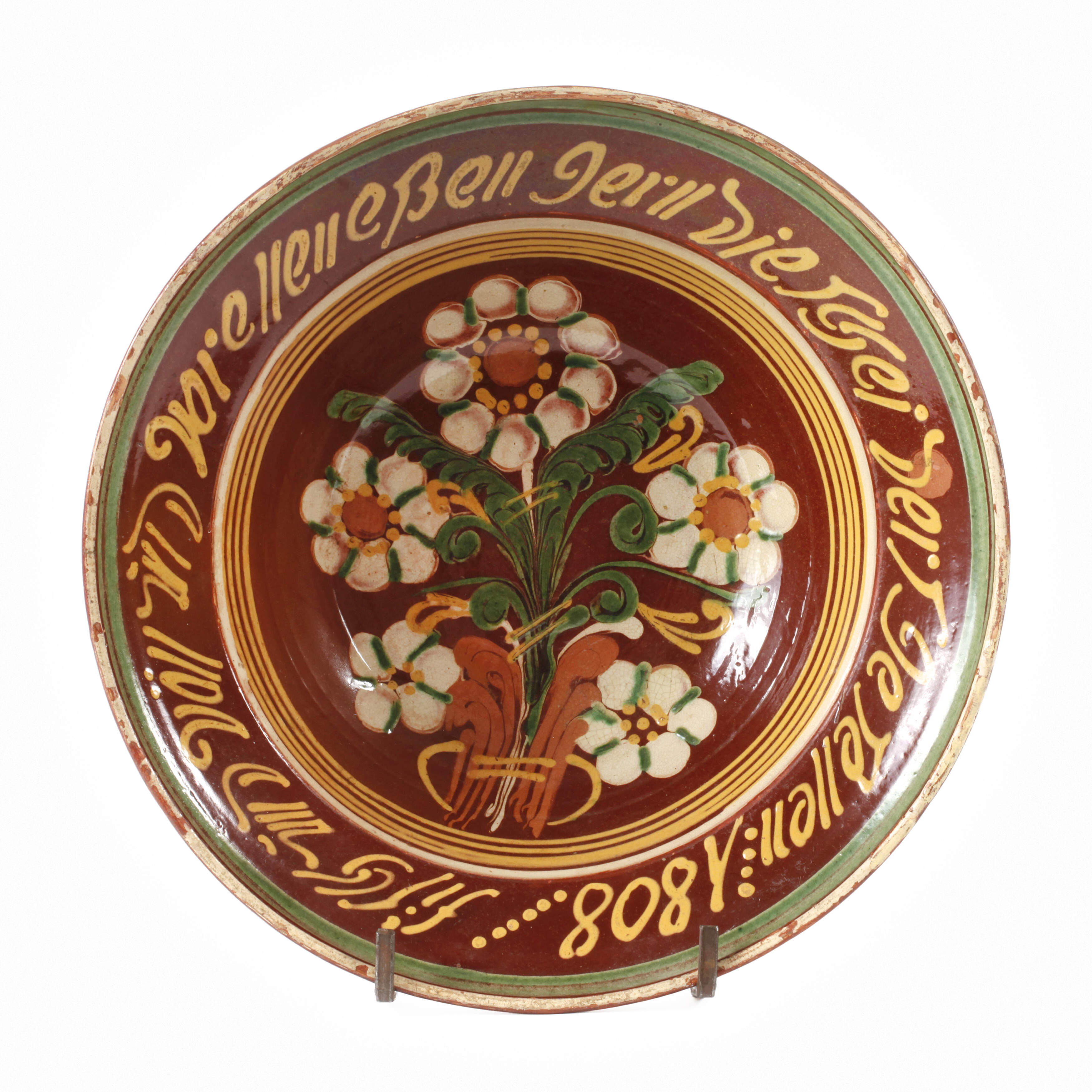 Hafnerkeramik mit Spruchband