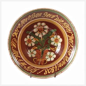 Hafnerkeramik mit Spruchband