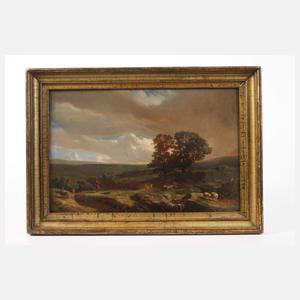 Hügelige Landschaft mit aufziehendem Gewitter