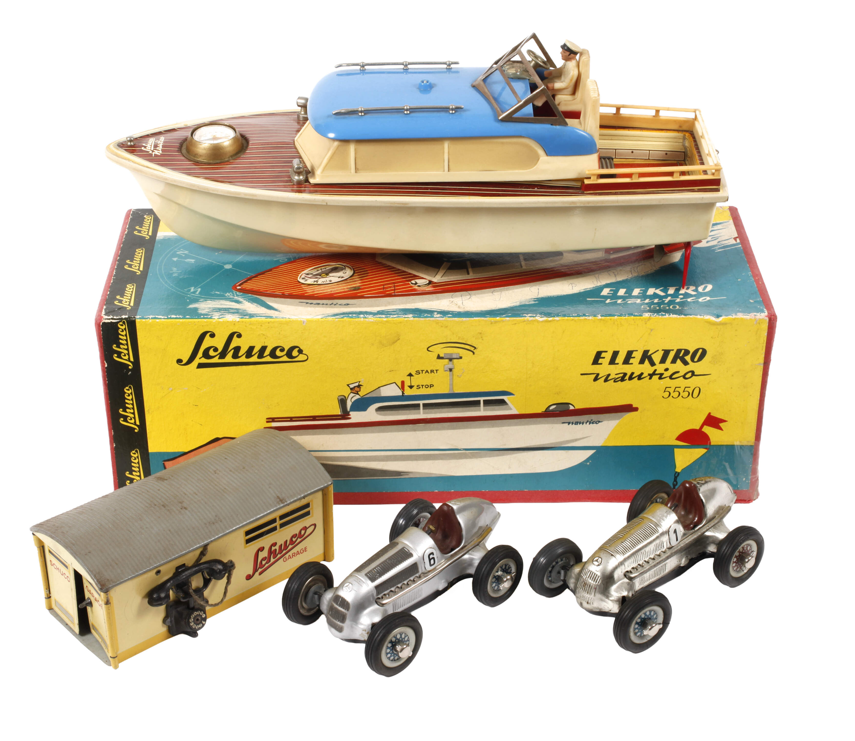 Konvolut Schuco Patent-Fahrzeuge und Garage