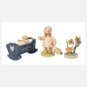 Wendt & Kühn frühe Kinderfigur, Wiege und Blume