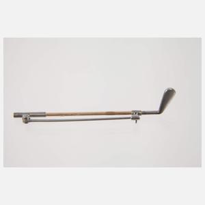 Brosche als Golfschläger
