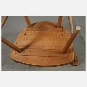 Drei Armlehnstühle