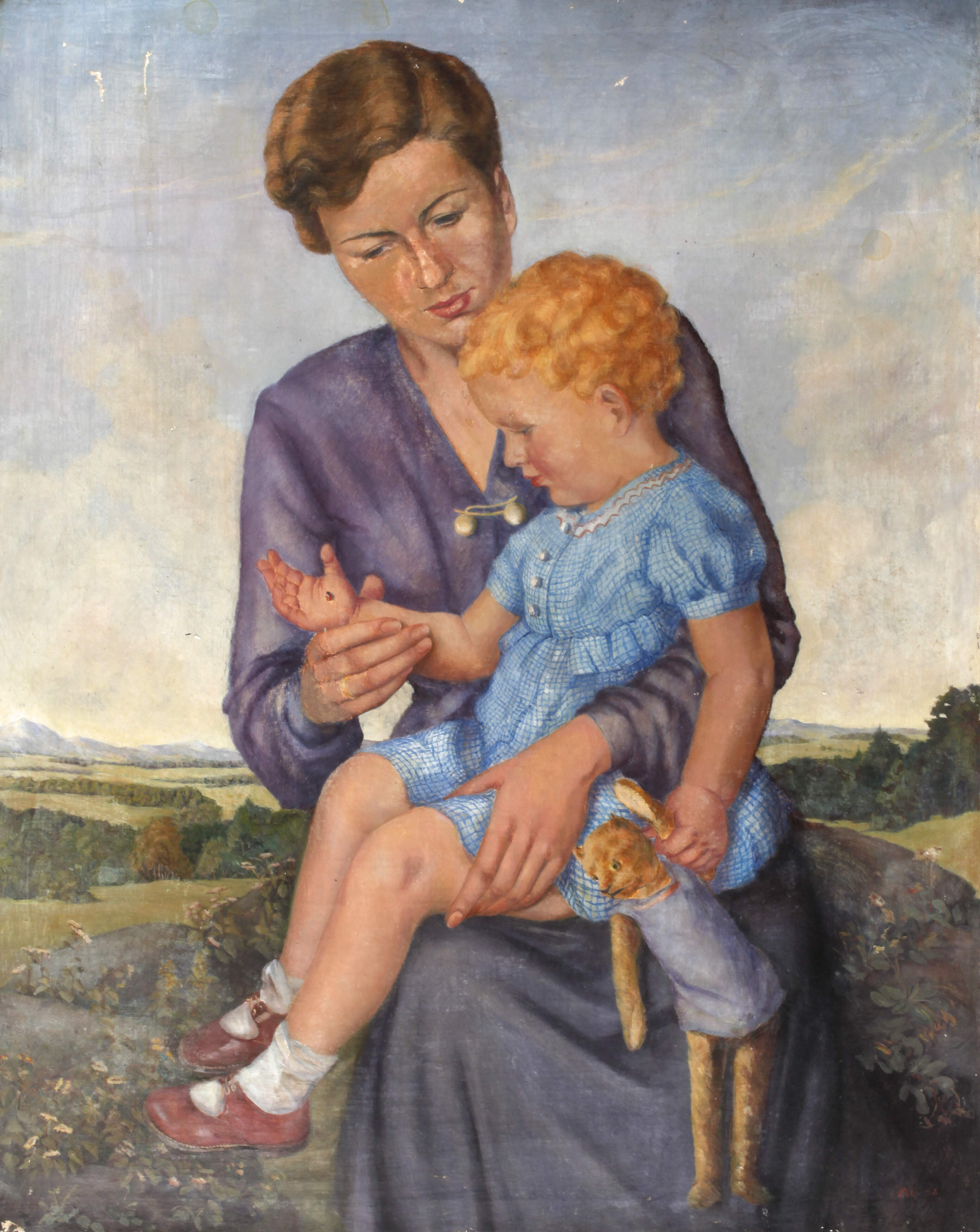 Mutter mit Kind und Marienkäfer
