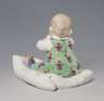 Meissen, Jugendstil-Figur "Kind, auf einem Kissen sitzend"