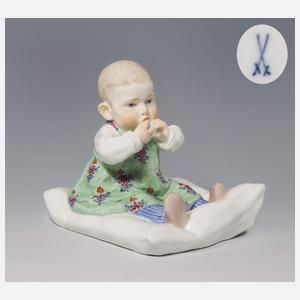 Meissen, Jugendstil-Figur "Kind, auf einem Kissen sitzend"
