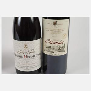 Vier Flaschen Rotwein