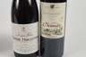 Vier Flaschen Rotwein