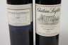 Vier Flaschen Rotwein