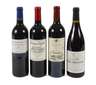 Vier Flaschen Rotwein
