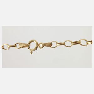 Goldring und Kette